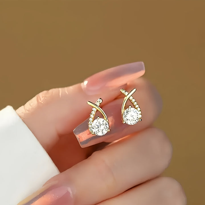Stud earrings with gold cross and zirconia stones